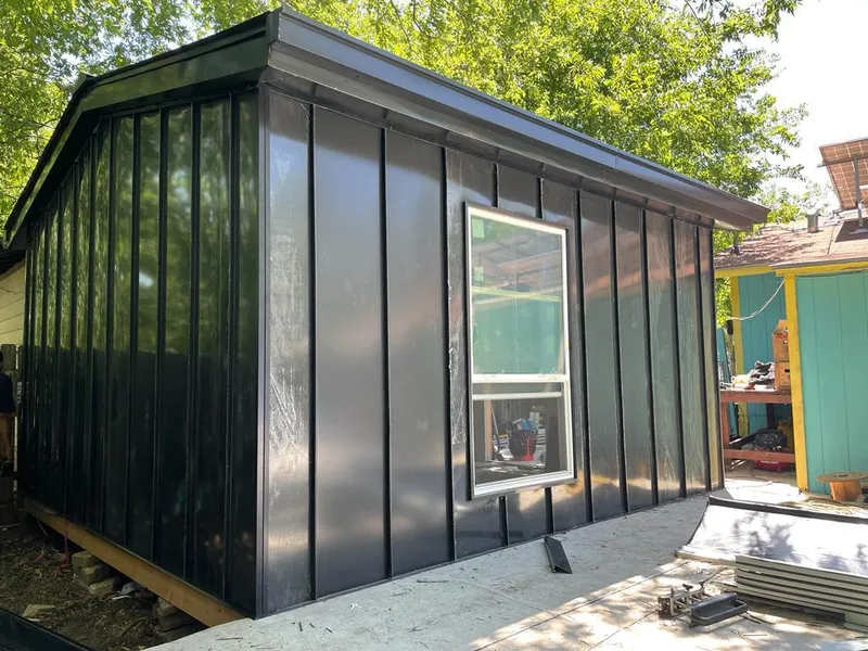 Black standing seam metal wall panels for Roof Inspection in Goodyear